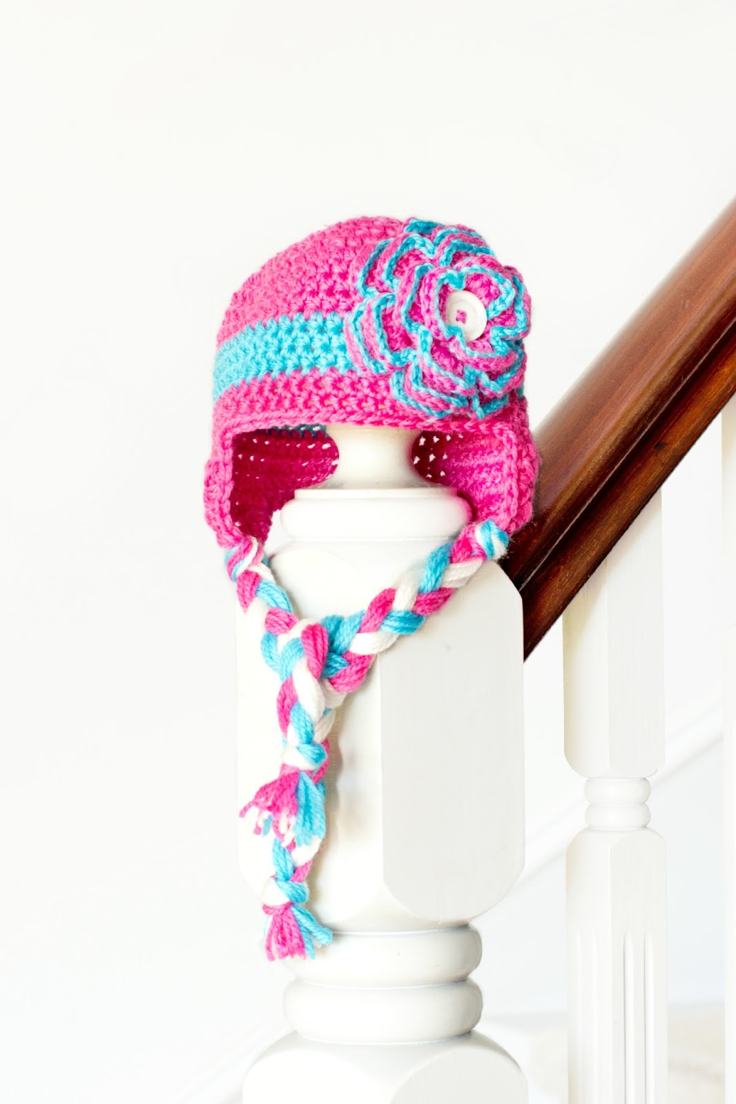Baby Earflap Hat Knitting Pattern Floral Ba Earflap Hat Interweave