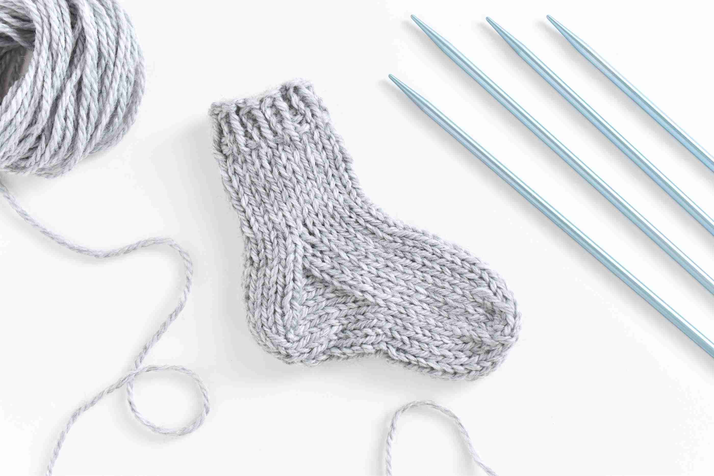 Free Knitting Patterns For Socks On Four Needles Knit A Small Sock With A Step Step Practice Pattern