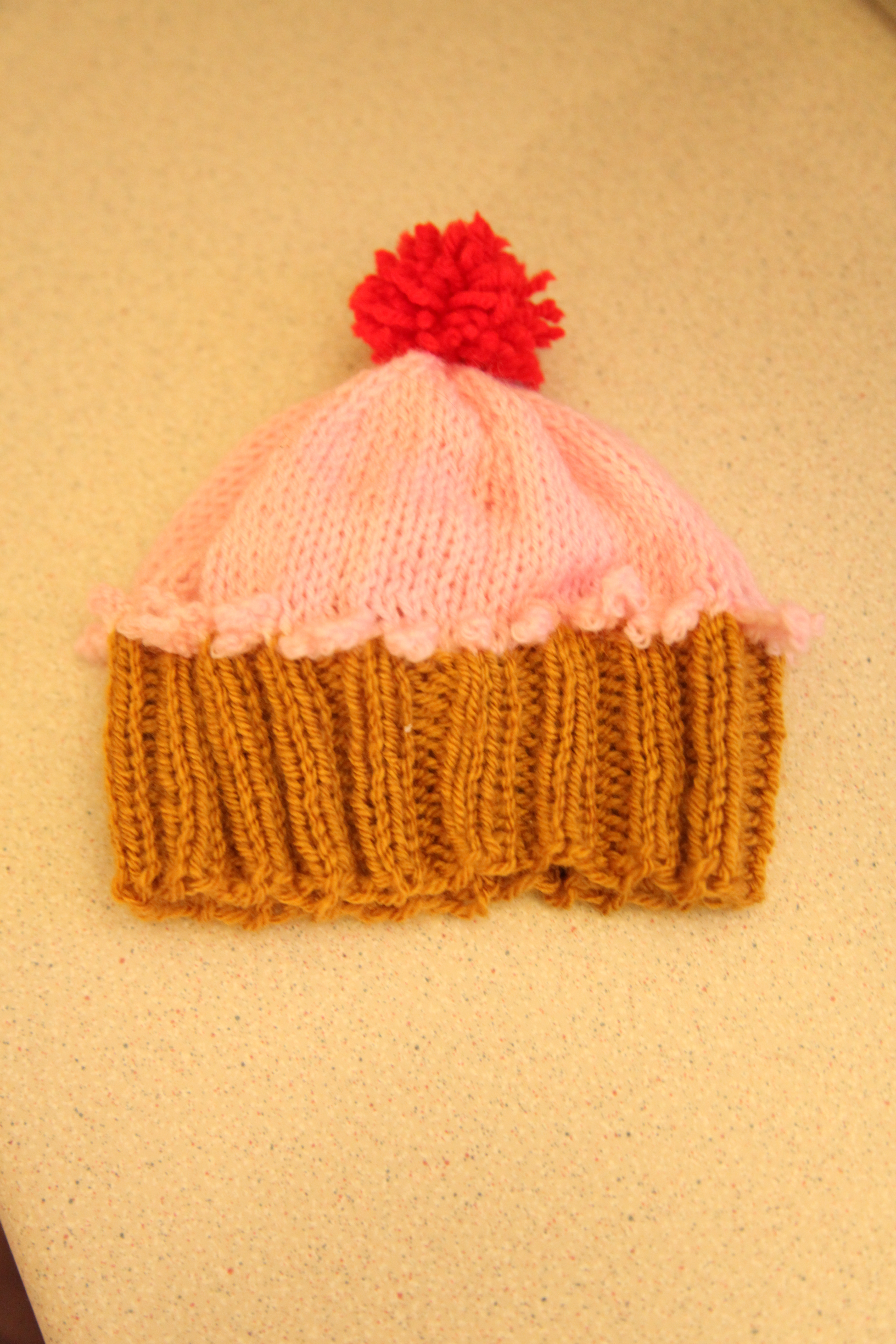 Knitted Cupcake Hat Pattern Cupcake Hat The Cherry On Top Of Free Patterns Just Another Knitter