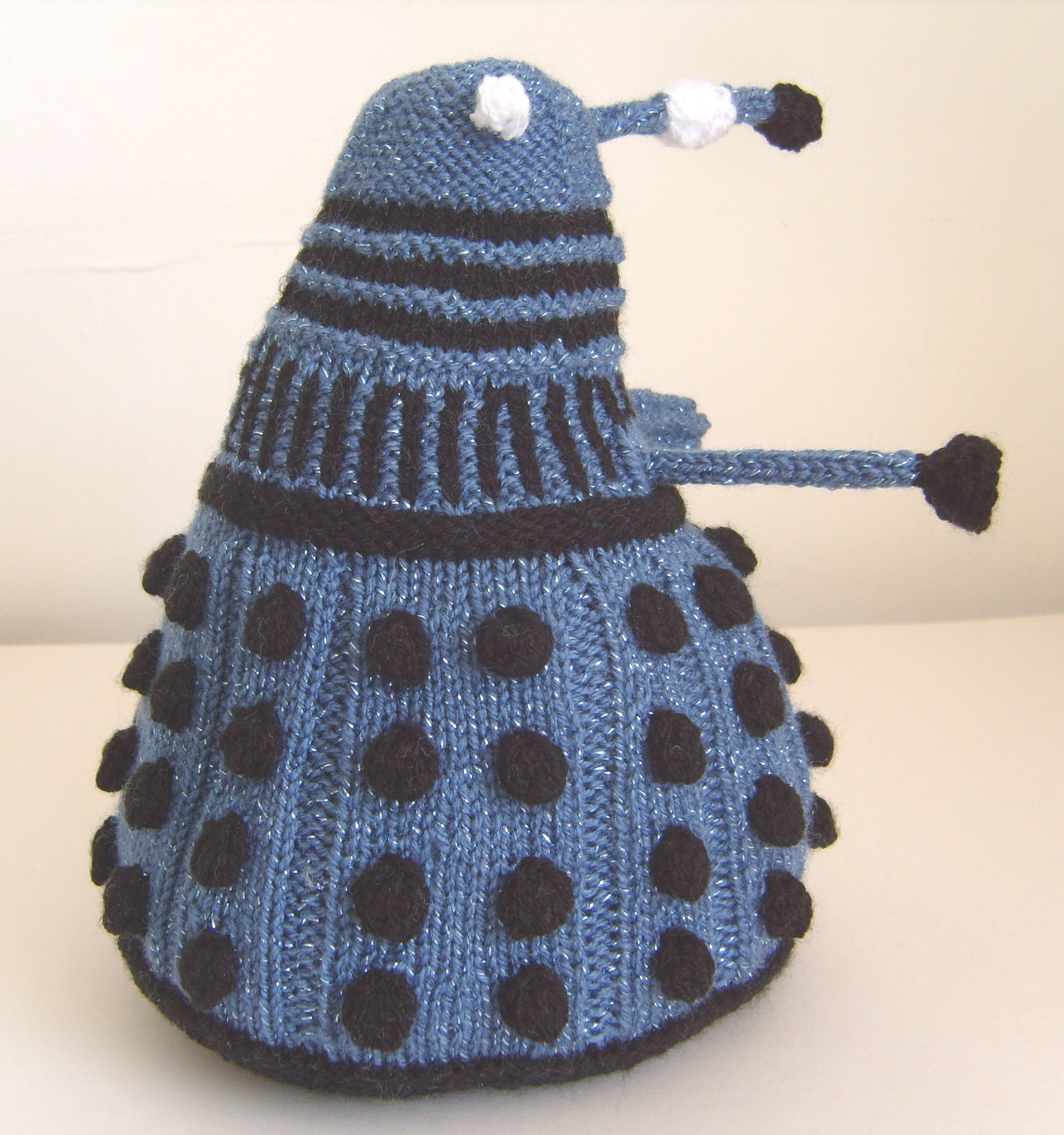 Knitted Dalek Pattern Hand Knitted Dalek In Steel Blue Lurex With Black Details